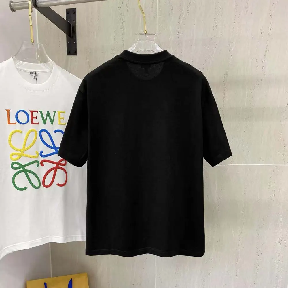 Side angle showing fit of Loewe Men Glitch Anagram T-shirt in cotton