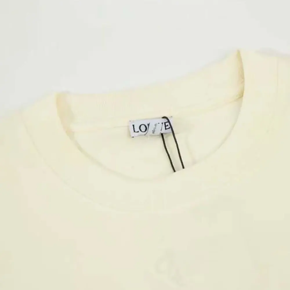 Side angle showing fit and fabric texture of Loewe Men LOEWE Neon T-shirt