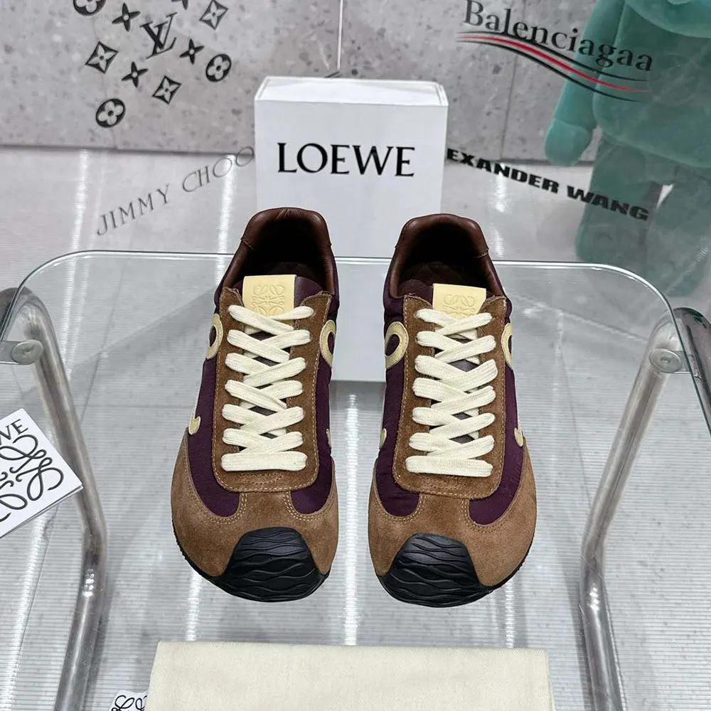 Close-up on embossed Loewe detail on brown Ballet Runner 2.0 sneaker