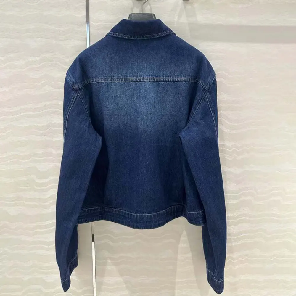 Side angle showing silhouette of Miu Miu Women Denim Trucker Jacket