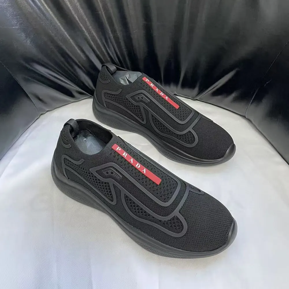Overhead view of Prada Men Americas Cup Knit Slip-On-Black slip-on pair