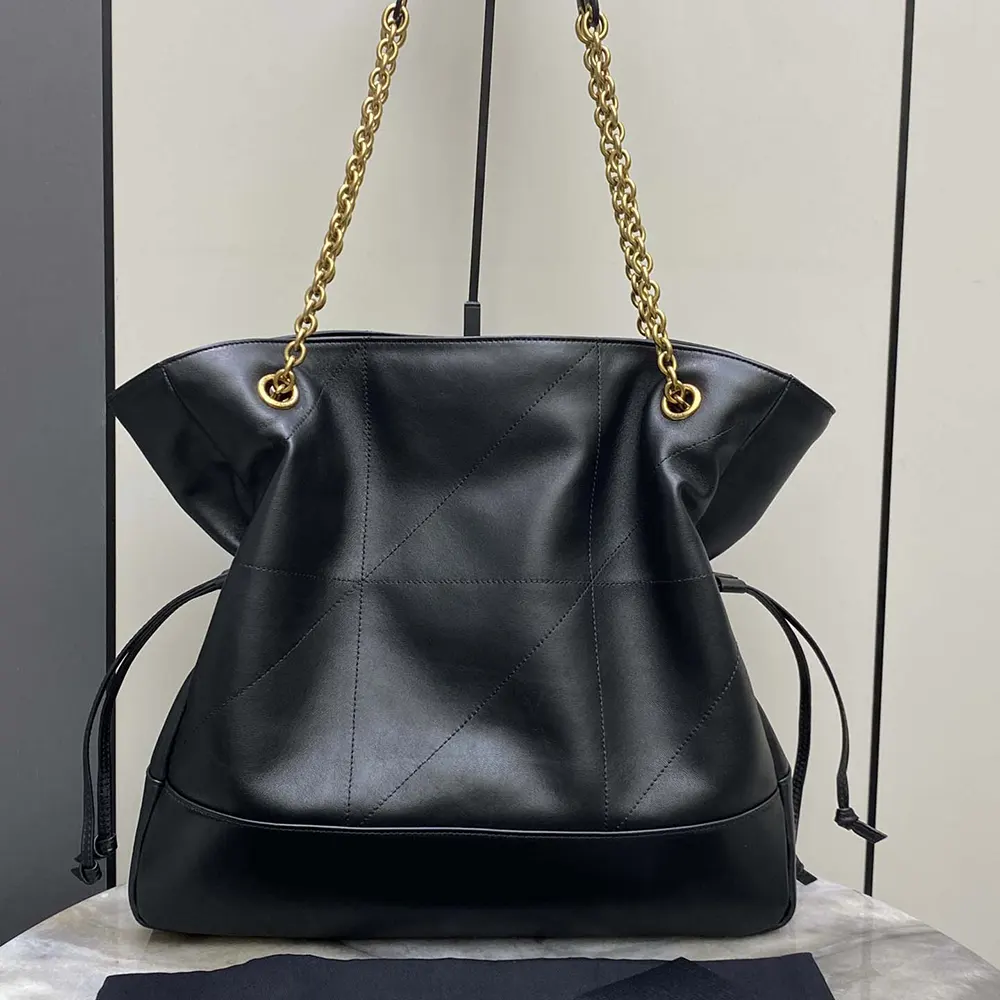 Side angle showing silhouette of Saint Laurent YSL Women Jamie Shopping bag