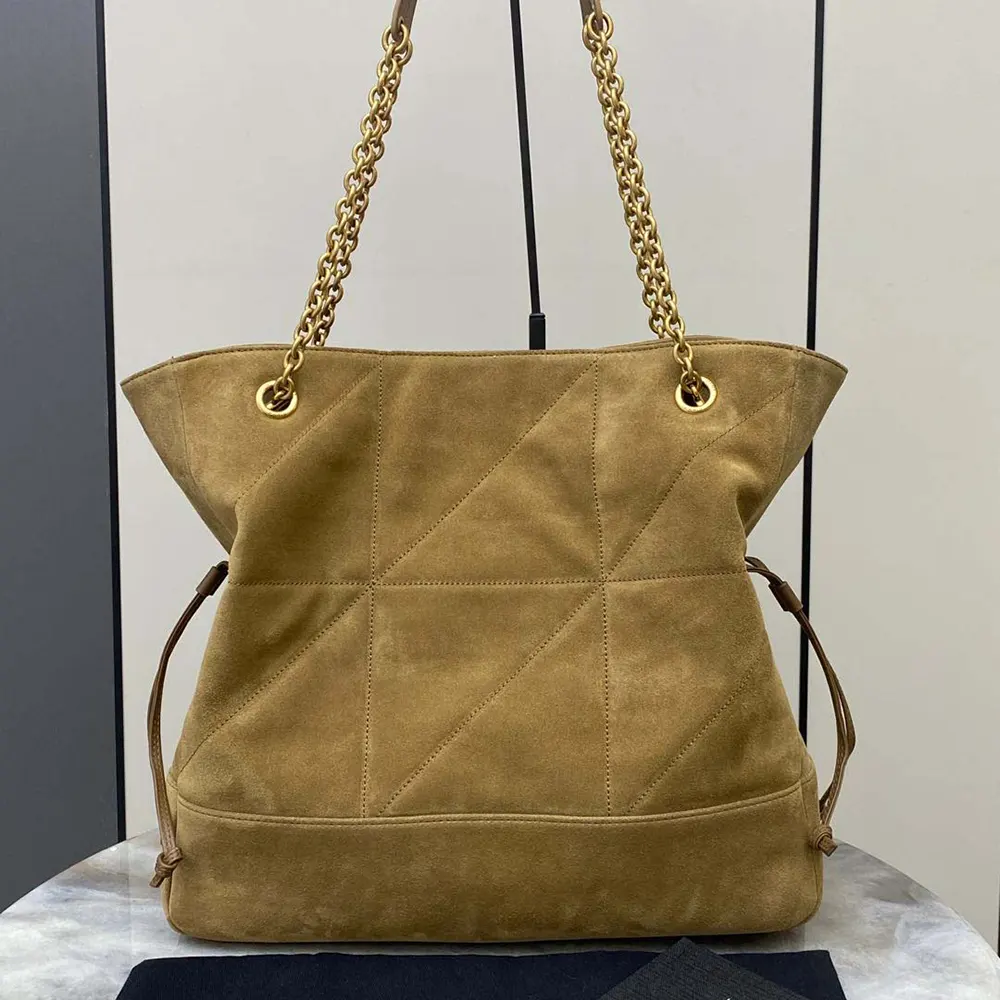 Side profile showing suede texture of Saint Laurent YSL Jamie Shopping