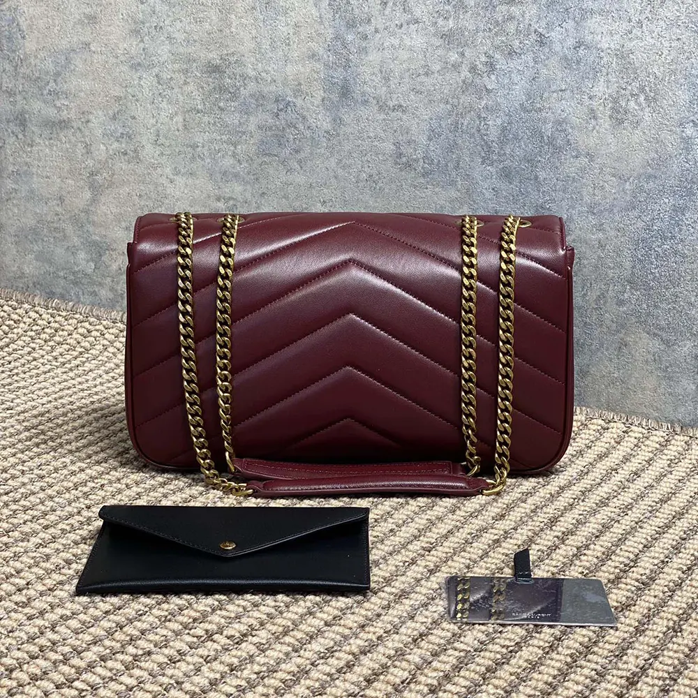 Side angle showing quilted matelasse lambskin texture on Loulou Medium