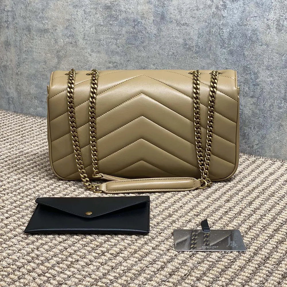 Side angle showing quilted texture and chain strap of YSL Loulou Medium
