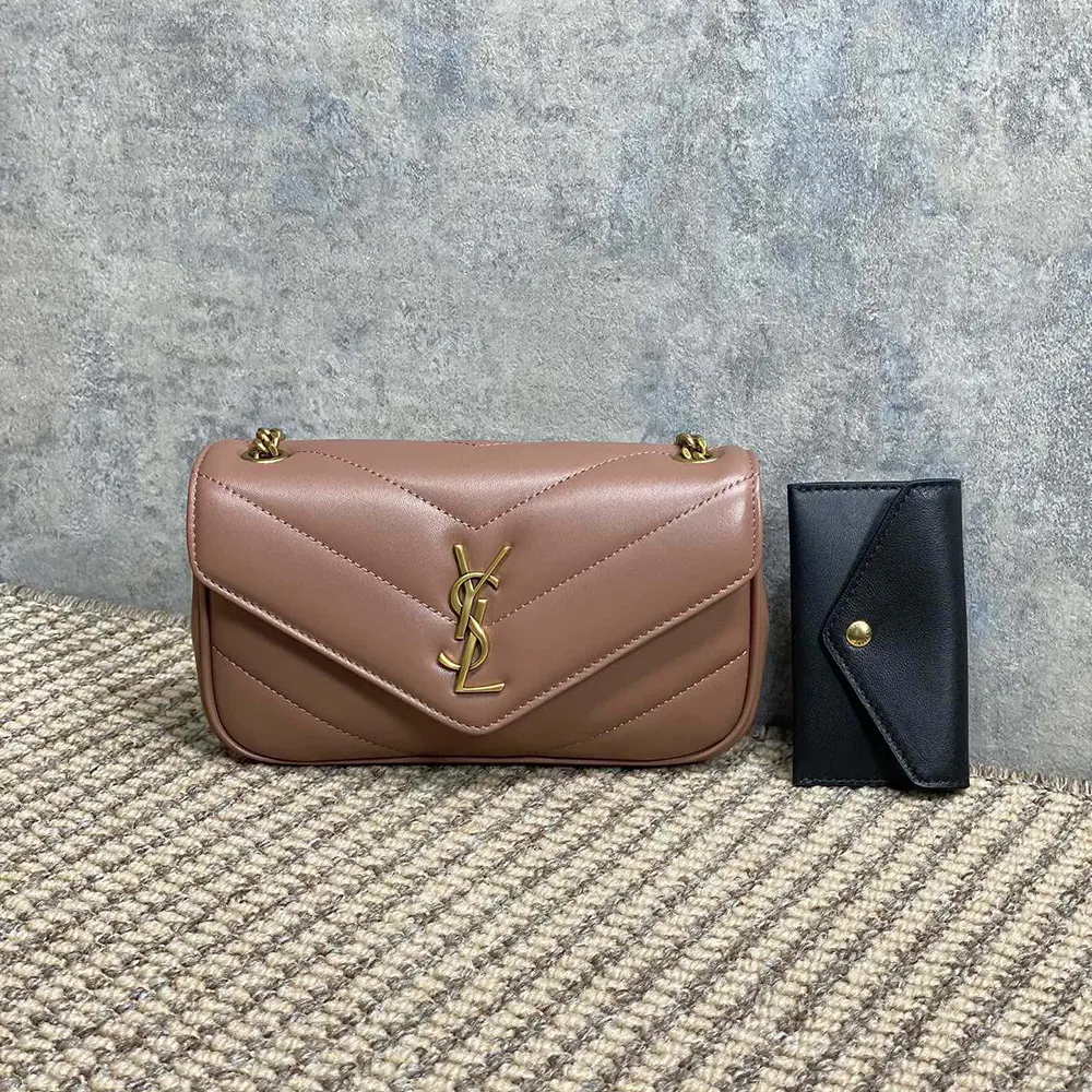 Close-up of gold-tone YSL logo on pink Loulou Mini bag