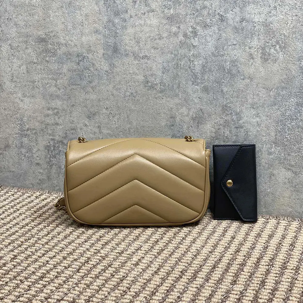 Side angle showing soft natural lambskin texture on YSL Loulou Mini