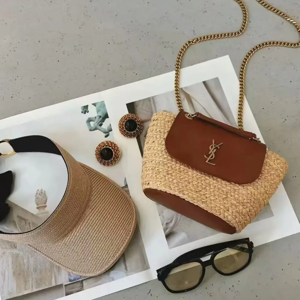 Side angle showing brown raffia texture and flap closure of Saint Laurent YSL Women Mini Manon in Raffia