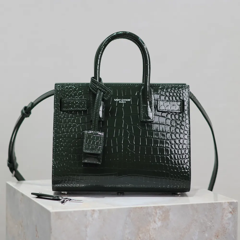 Front view of Saint Laurent YSL Women Sac De Jour in dark green leather