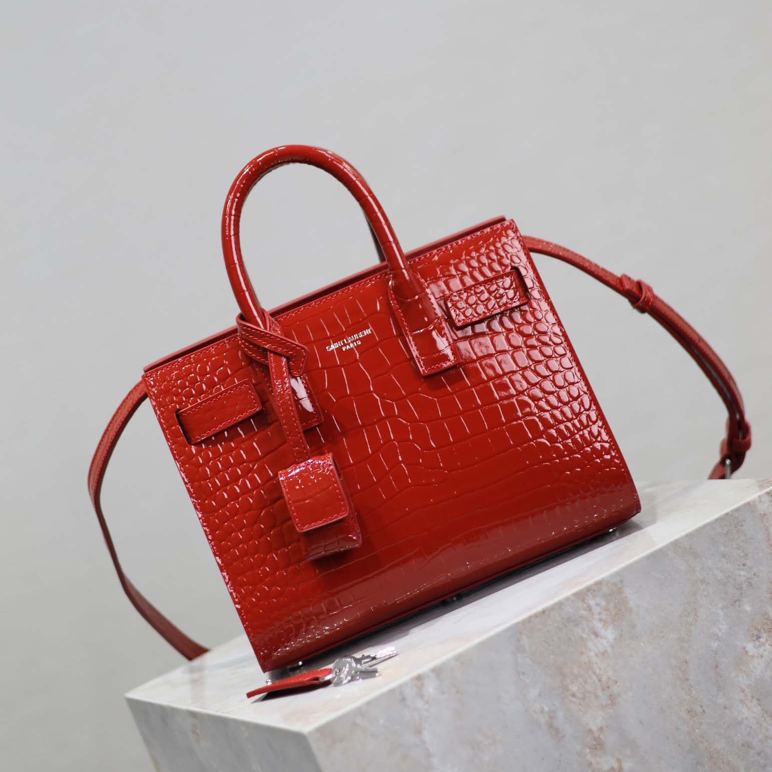 Side profile showing structure of Saint Laurent YSL Women Sac De Jour Nano-Red