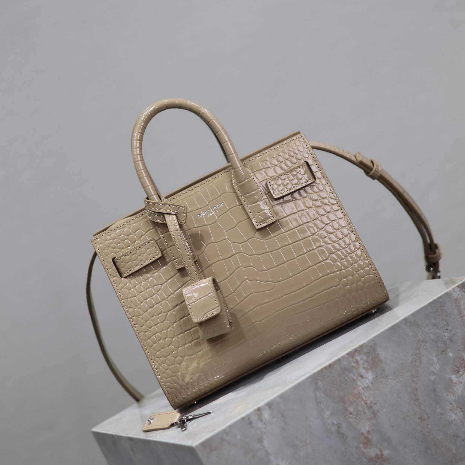 Side angle showing structured silhouette of Saint Laurent YSL Nano-Sandy bag