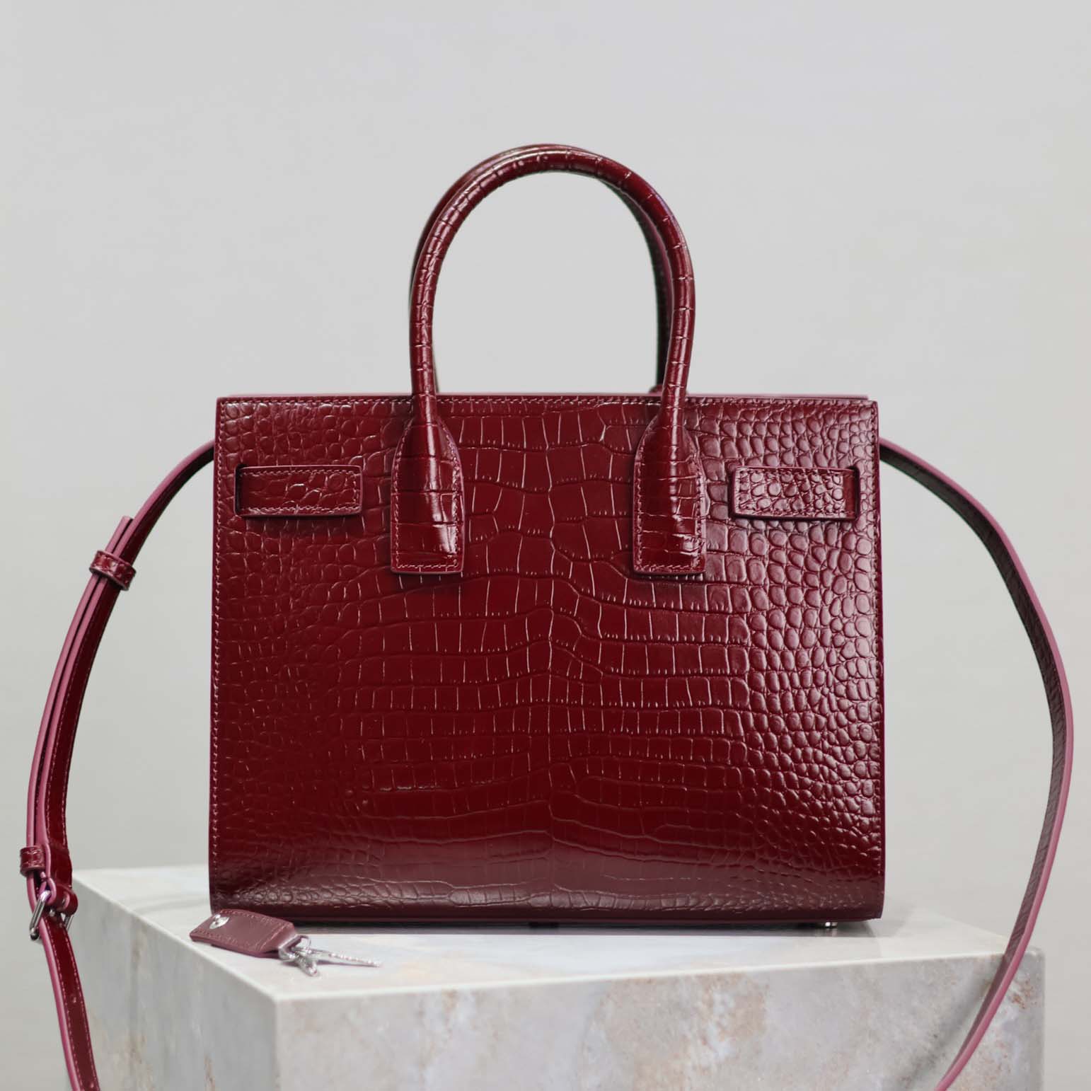 Side angle showing zipper and structured silhouette of Saint Laurent YSL bag