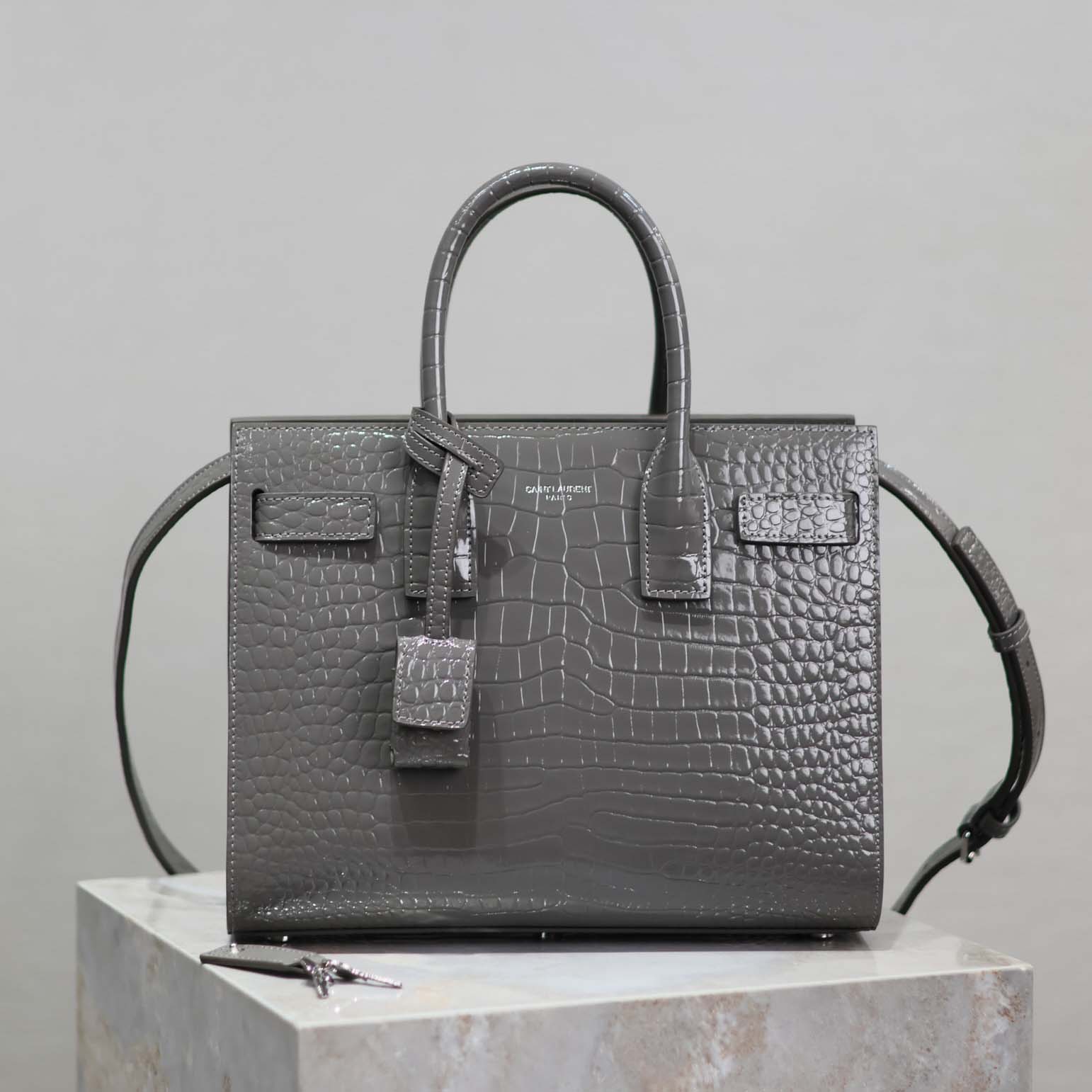 Front view of Saint Laurent YSL Women Sac De Jour embossed crocodile leather bag