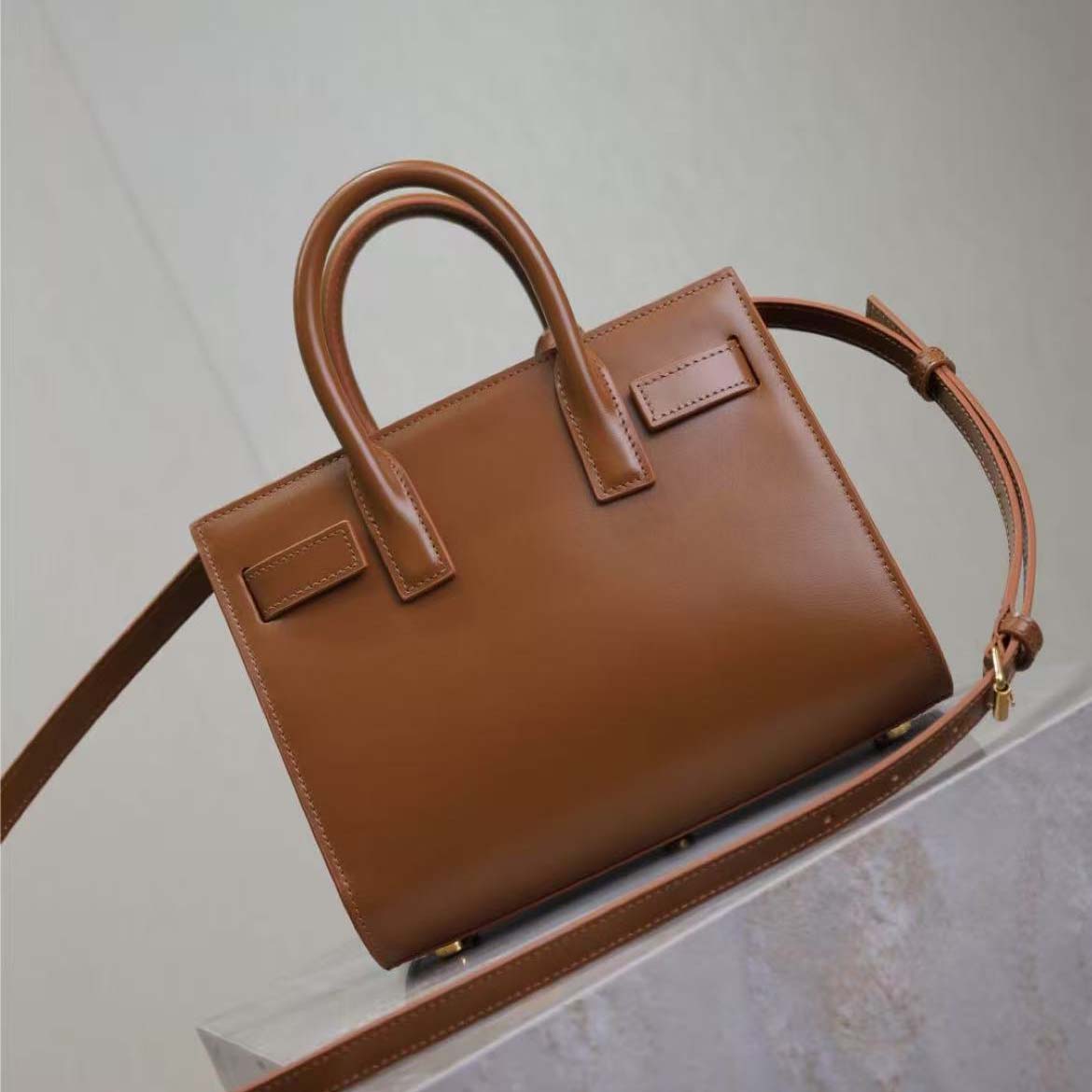 Side angle showing structured silhouette of Saint Laurent YSL Sac De Jour