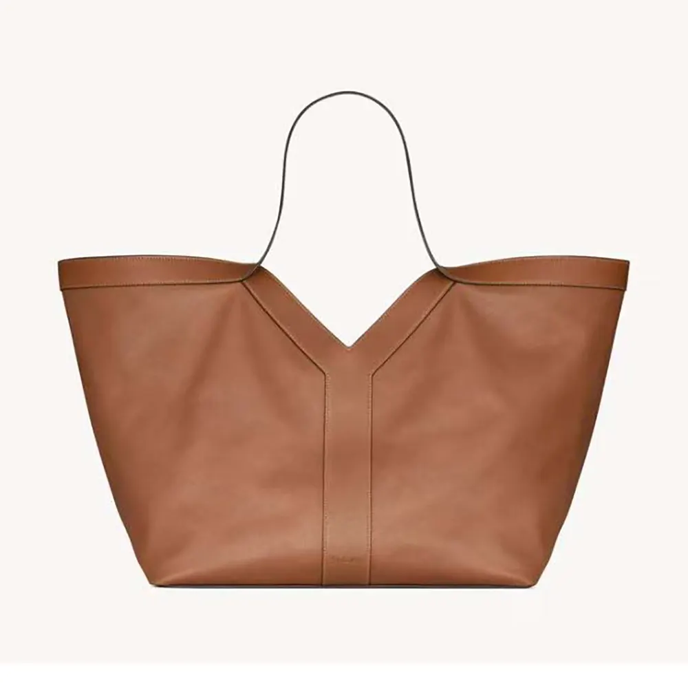 Front angle of Saint Laurent YSL Women Y Tote in Leather-Brown showcasing logo