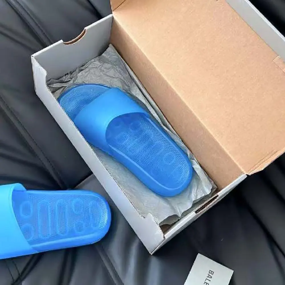 Top view showing textured footbed of Balenciaga Pool Transparent Slide Sandal