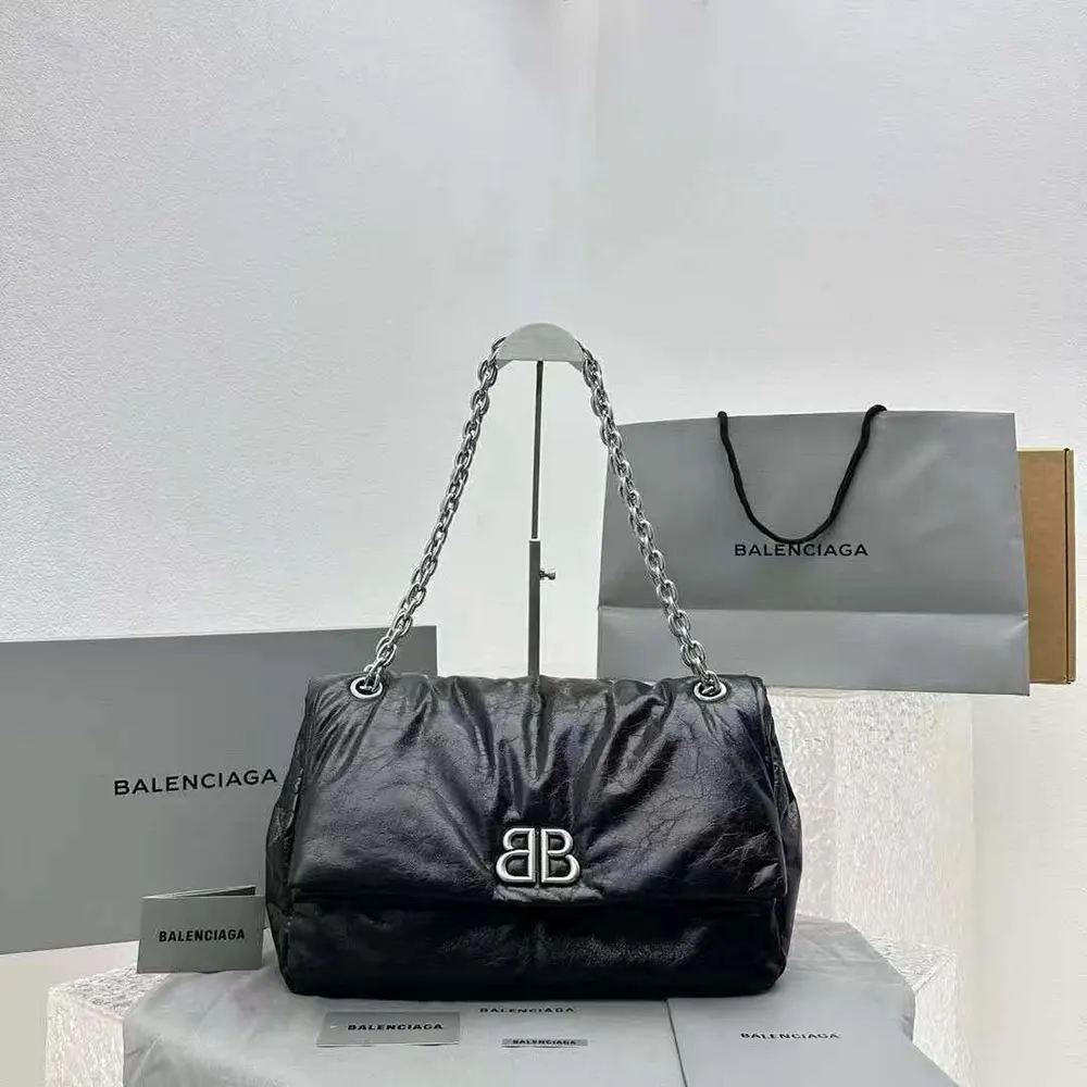 Close-up detail of silver chain on Balenciaga Women Monaco Large Chain Bag
