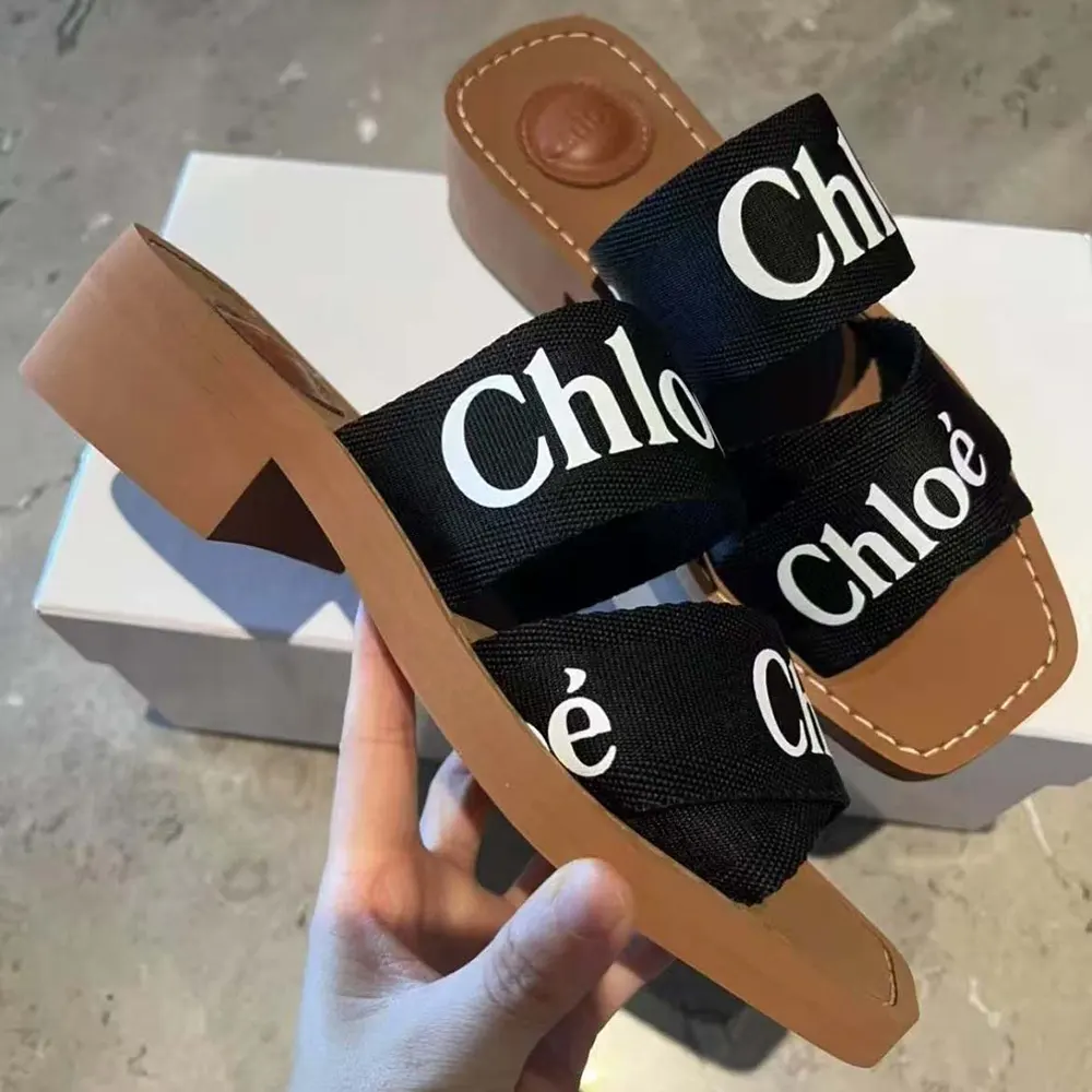 Top view of slip-on Chloe Women Woody Heeled Mule-Black highlighting silhouette