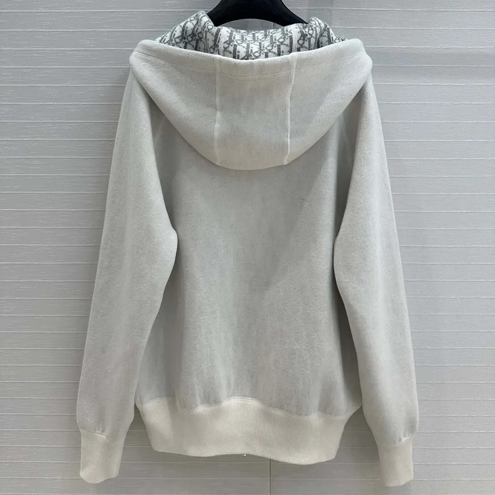 Side angle showcasing hood and silhouette of Dior Men Hooded Track Jacket