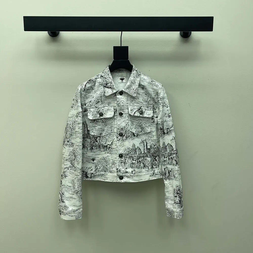 Close-up of button and blue Toile de Jouy Scotland detail on Dior Men Jacket White Cotton Denim