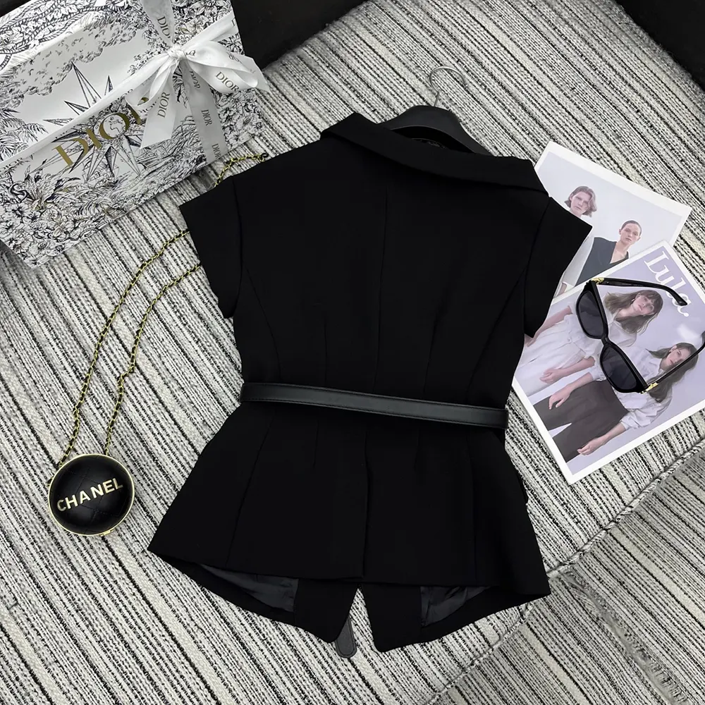 Side angle highlighting short sleeves and silhouette of Dior Women Asymmetric Jacket