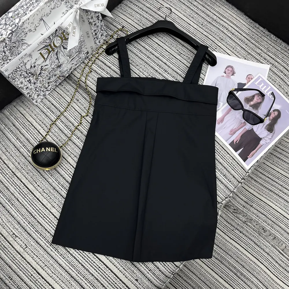 Side profile of Dior Women Blouse Black Cotton Poplin showcasing silhouette