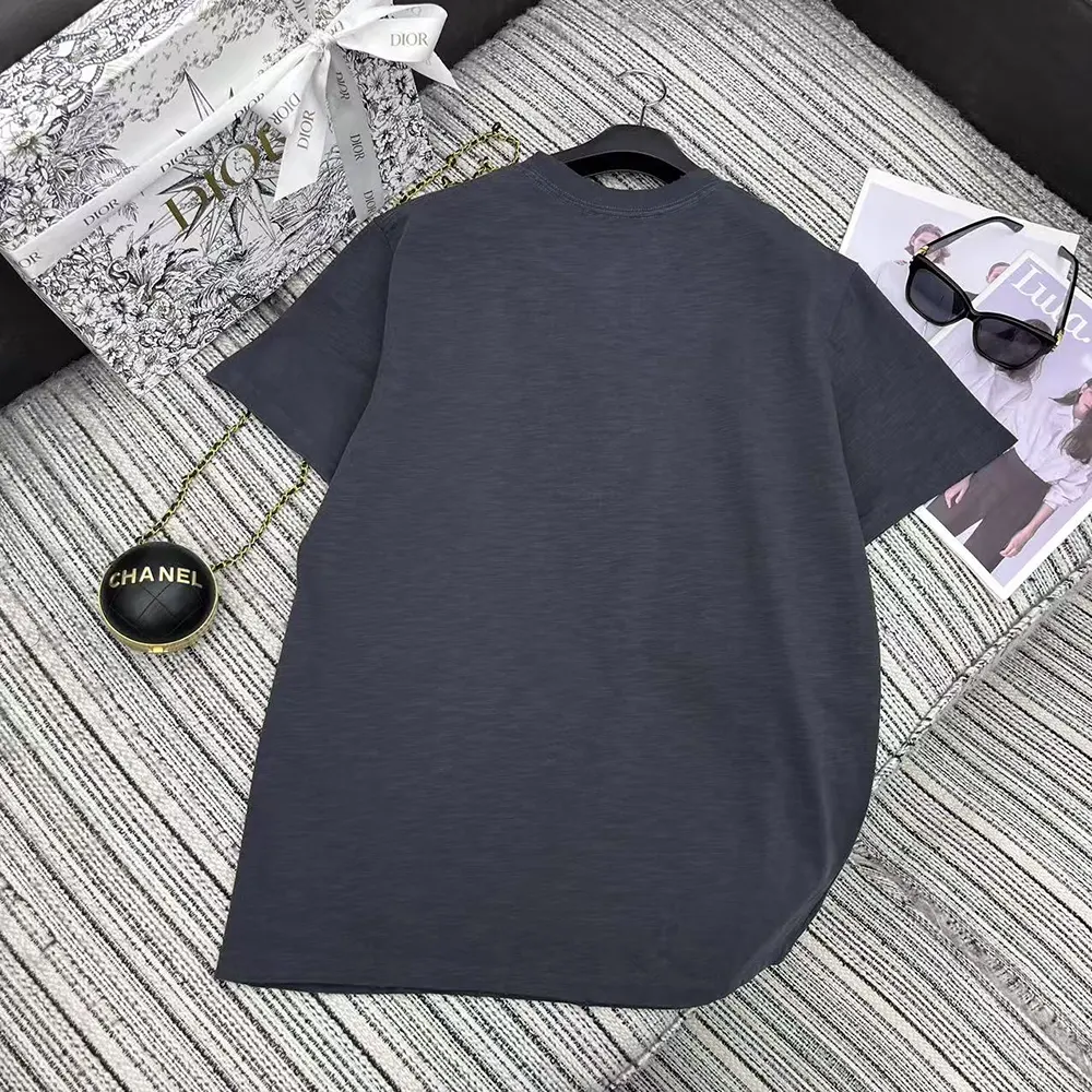 Side angle showing relaxed silhouette of Dior Women DIOR AND HYLTON NEL T-Shirt navy blue