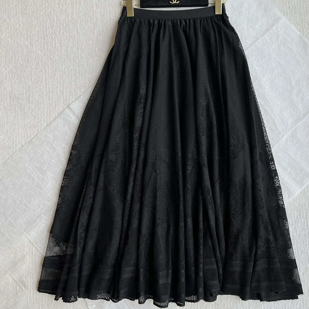 Close-up detail of black cotton-blend lace on Dior Women Flared Mid-Length Skirt
