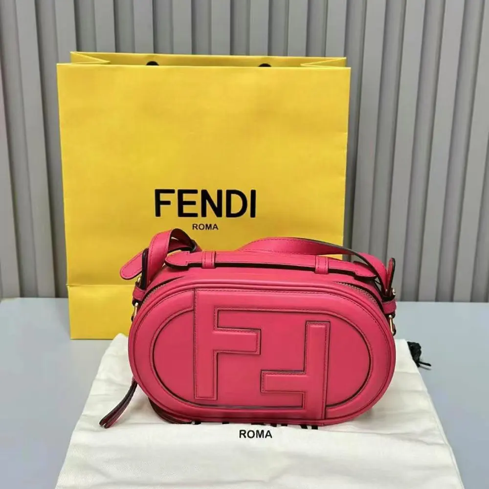 Close-up detail of gold O Lock hardware on Fendi pink leather bag