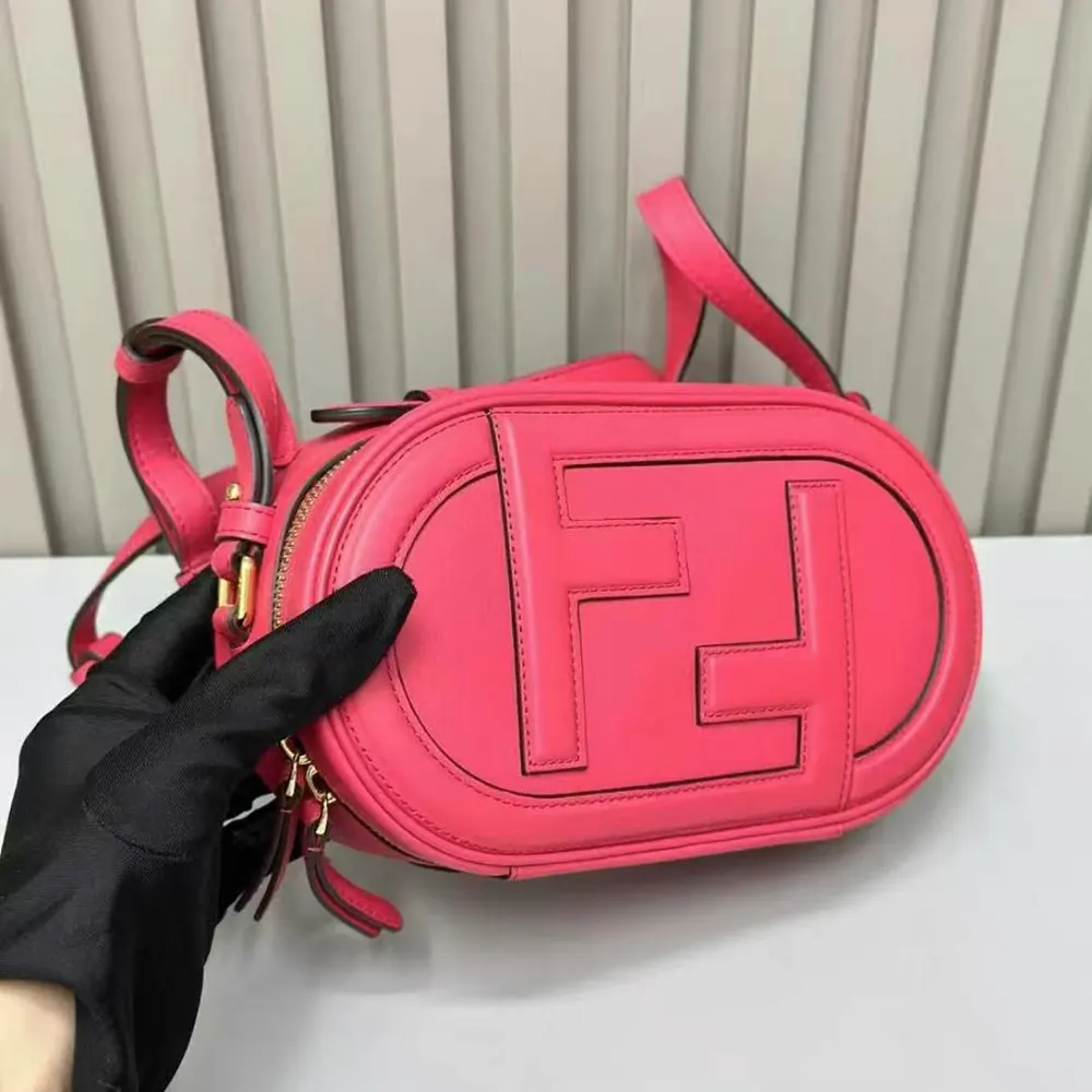 Side angle showing compact silhouette of Fendi Women O Lock Mini Camera Case