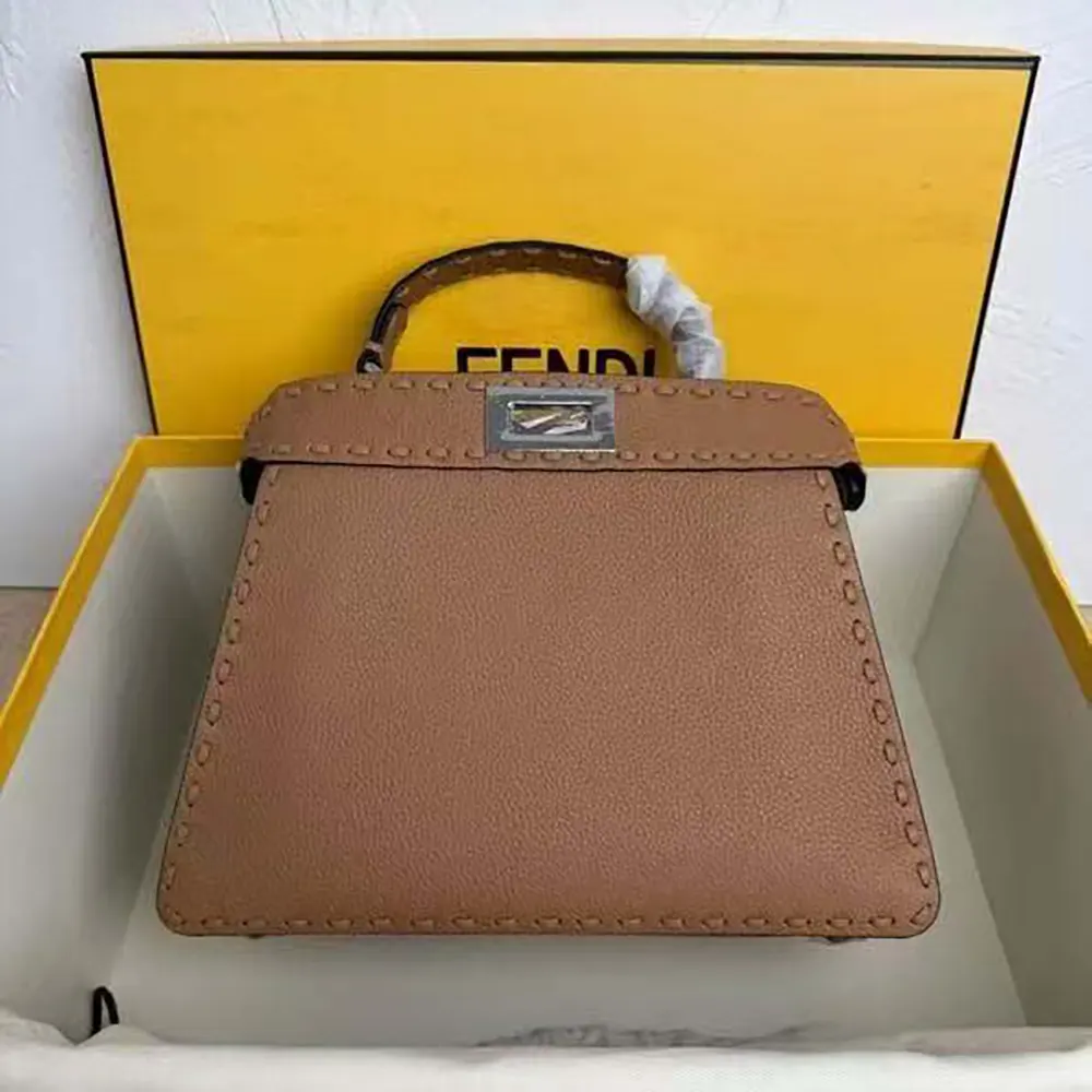 Close-up of gold hardware and Selleria stitching on Fendi bag