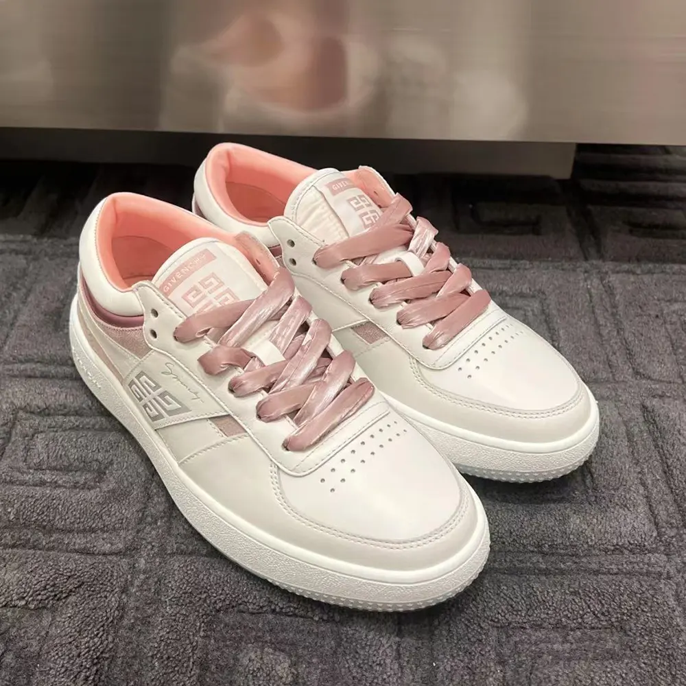 Close-up of pink leather and Givenchy logo hardware detail