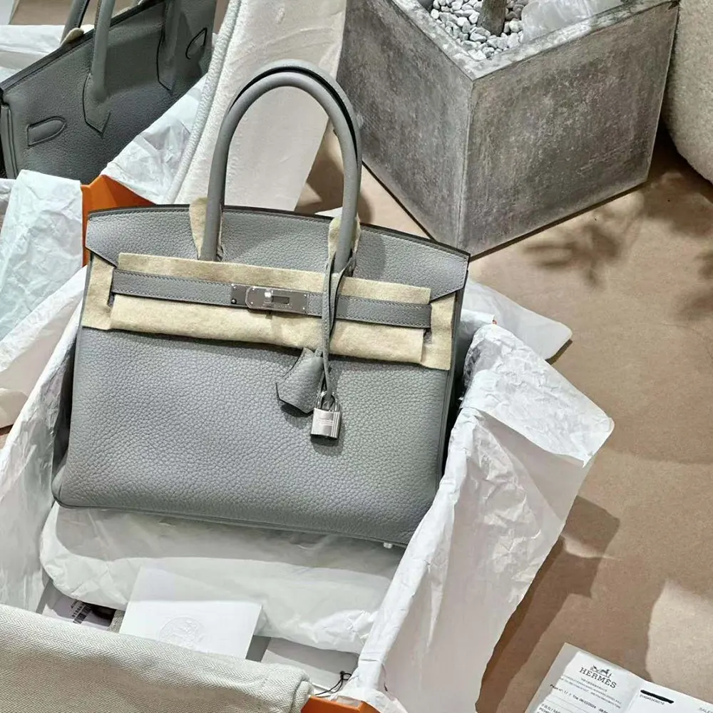 Close-up of silver hardware clasp on Hermes Birkin 30 Bag Blue Glacier
