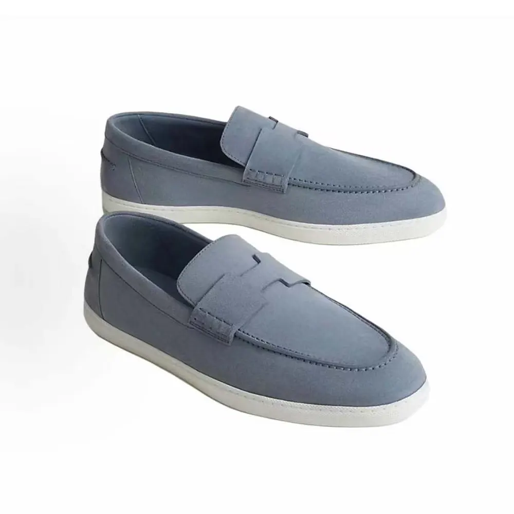 Close-up of blue lambskin texture on Hermes Men Job Loafer