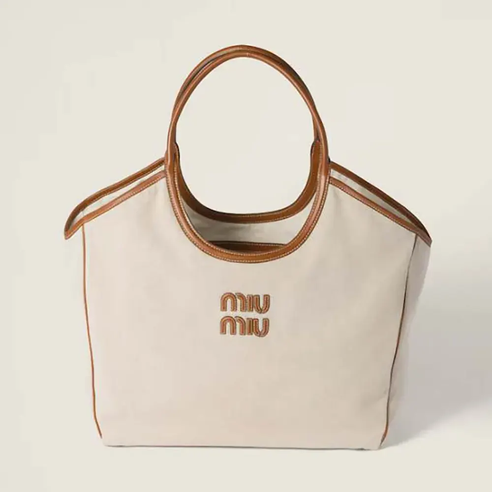 Front view of Miu Miu Women IVY Canvas and Leather Tote Bag in beige