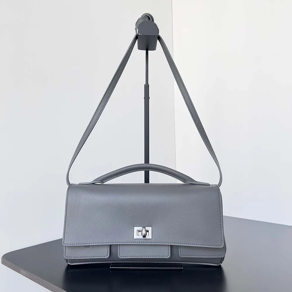 Close-up of silver hardware detail on Balenciaga Bel Air Clutch