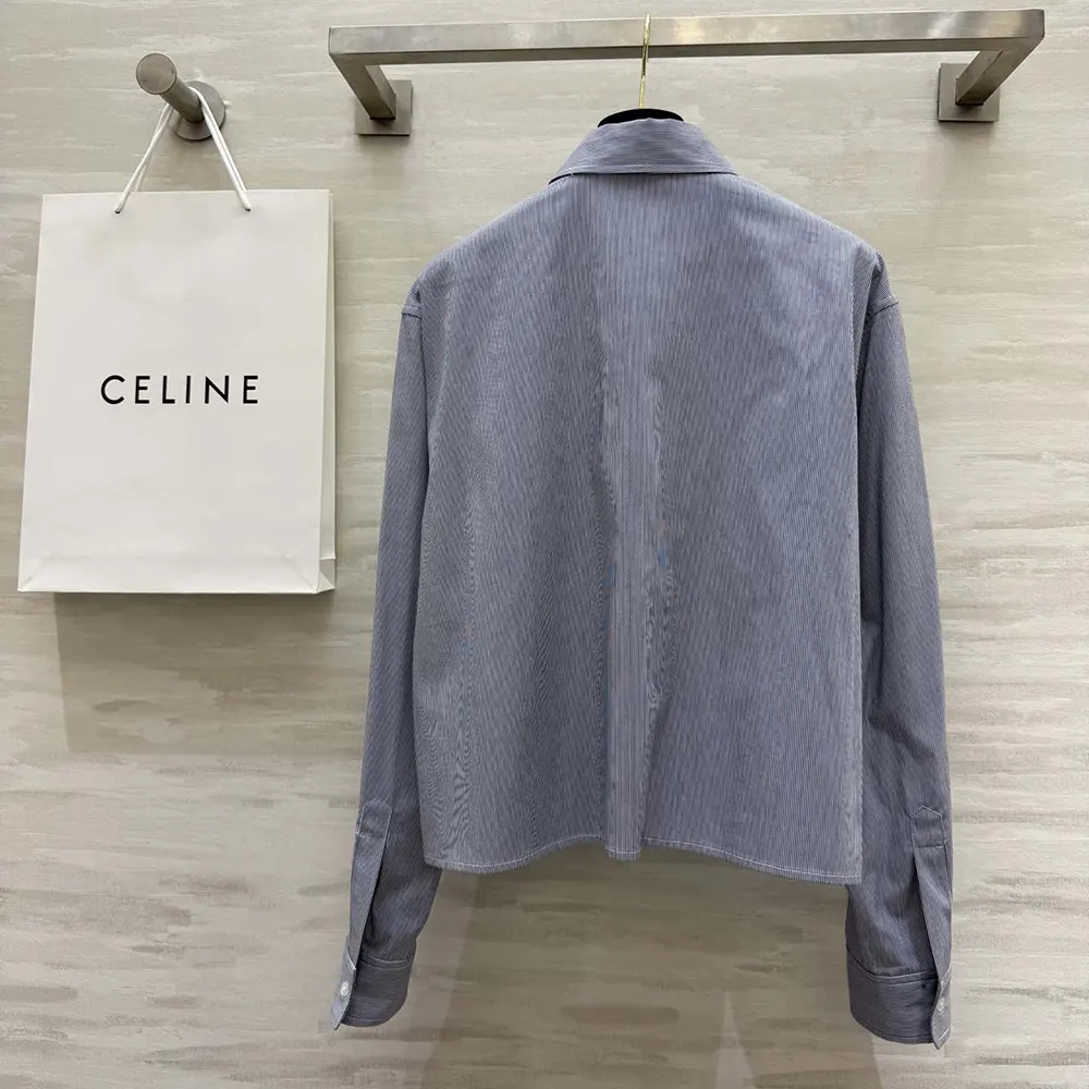 Side angle showing relaxed fit of Celine Women Cropped Shirt