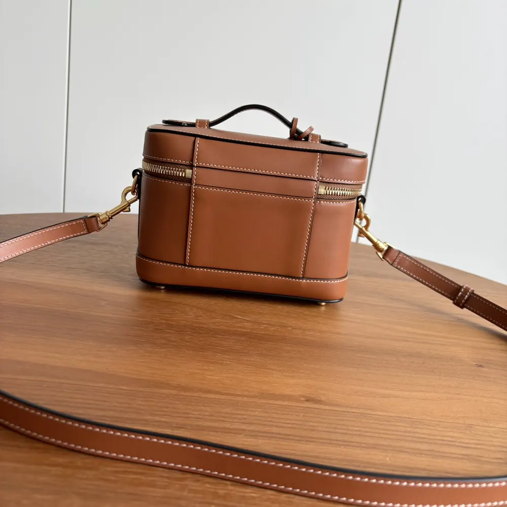Side angle showing sleek silhouette of Celine Unisex Vanity bag