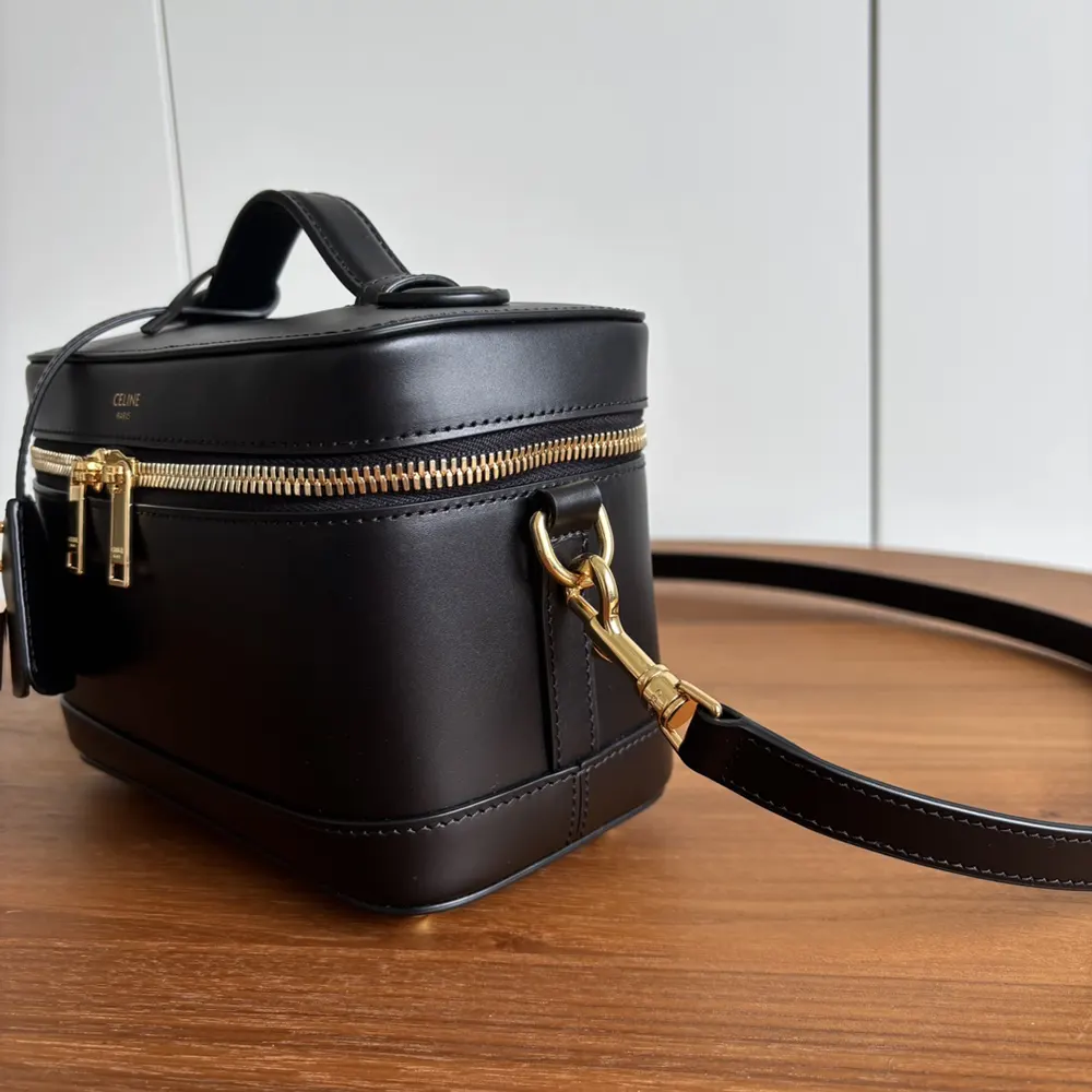 Side angle showing structured shape of Celine Unisex Vanity bag