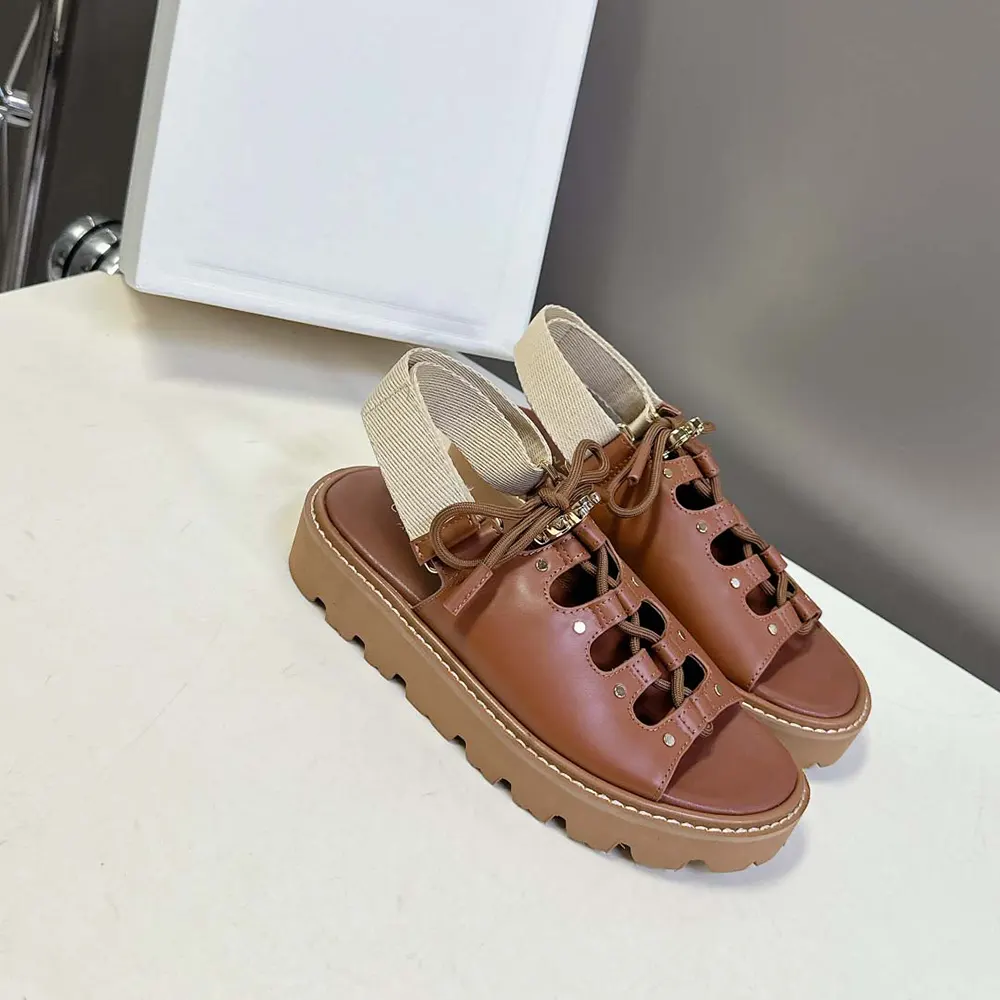 Top angle showing chunky sole and slip-on design of Celine Women Billie Chunky Sandal
