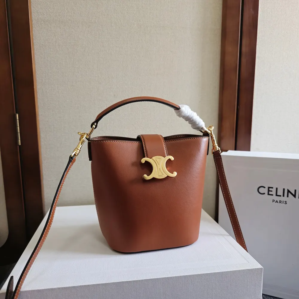Close-up of gold-tone hardware on Celine Women Small Bucket Louise bag
