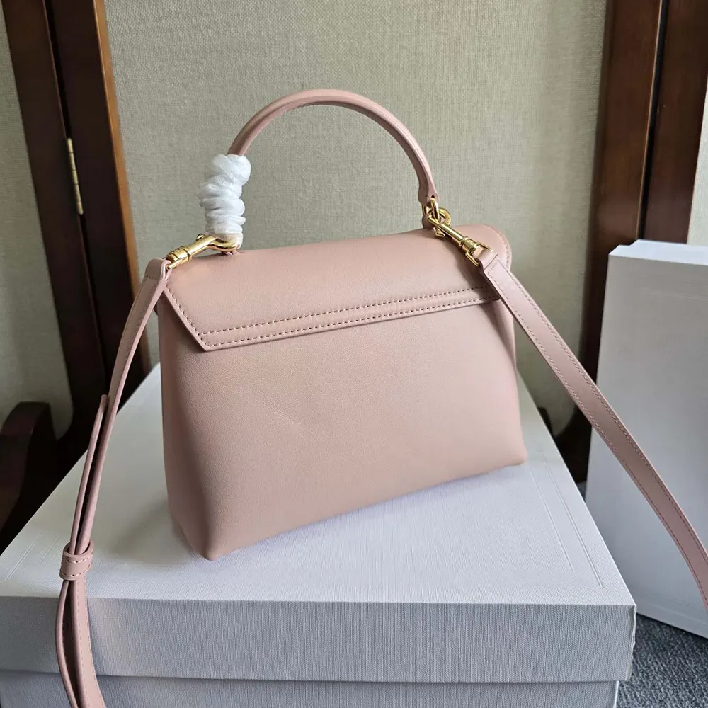 Side angle showing slim silhouette of Celine Women Teen Nino Bag in pink