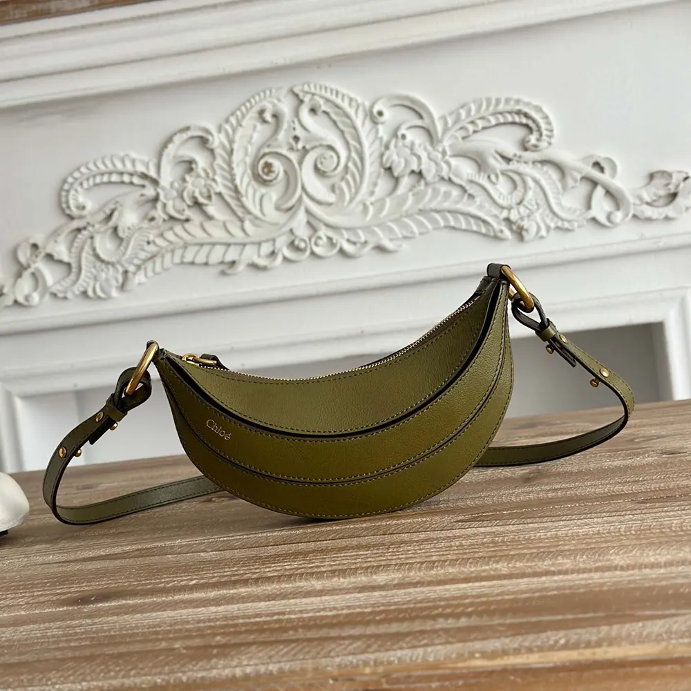 Close-up on polished gold-tone hardware of Chloe Women Banana Bag