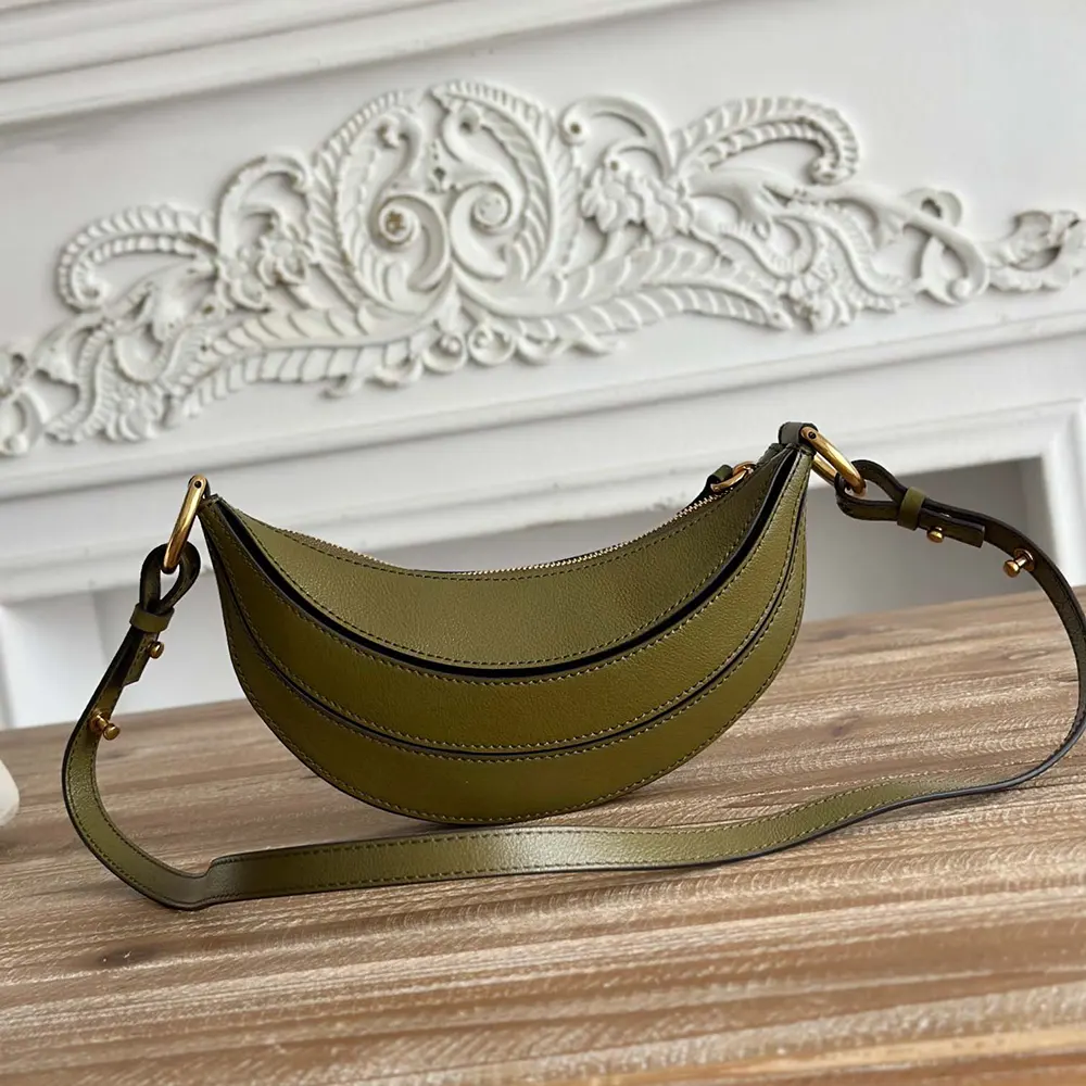 Side angle showing grain texture of Chloe Women Banana Cross-body Bag