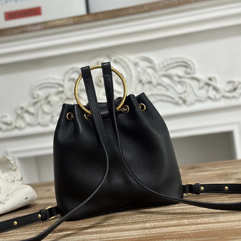 Side angle showing silhouette and zipper details of Chloe Women Small Bracelet Backpack