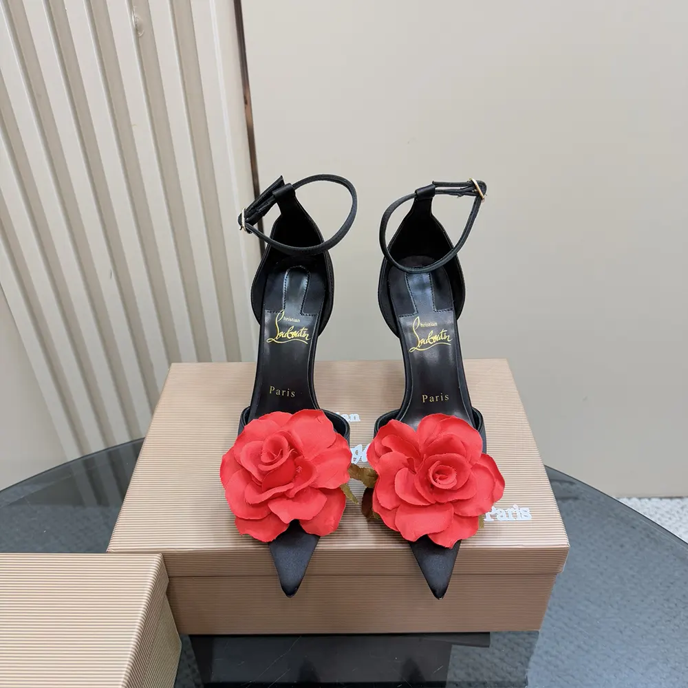 Close-up detail of ankle strap and buckle on Bellarose pumps