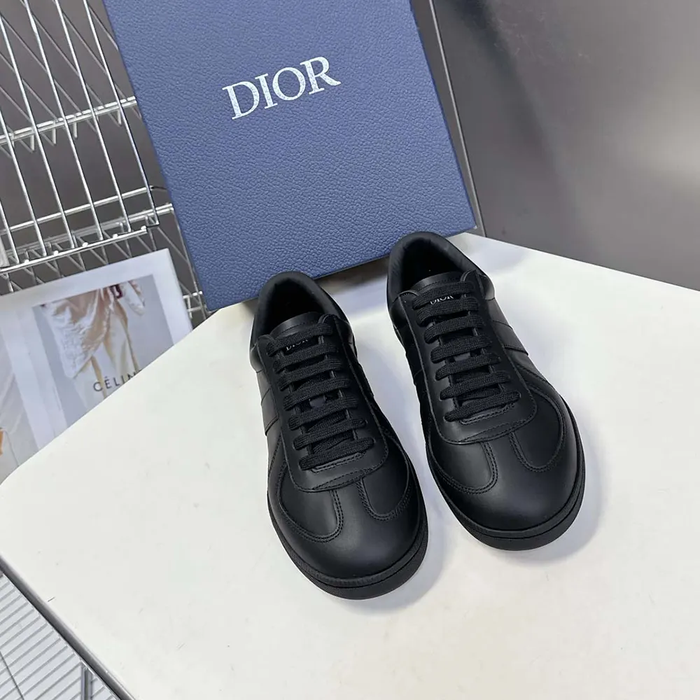 Close-up of black smooth calfskin and Dior logo on sneaker heel