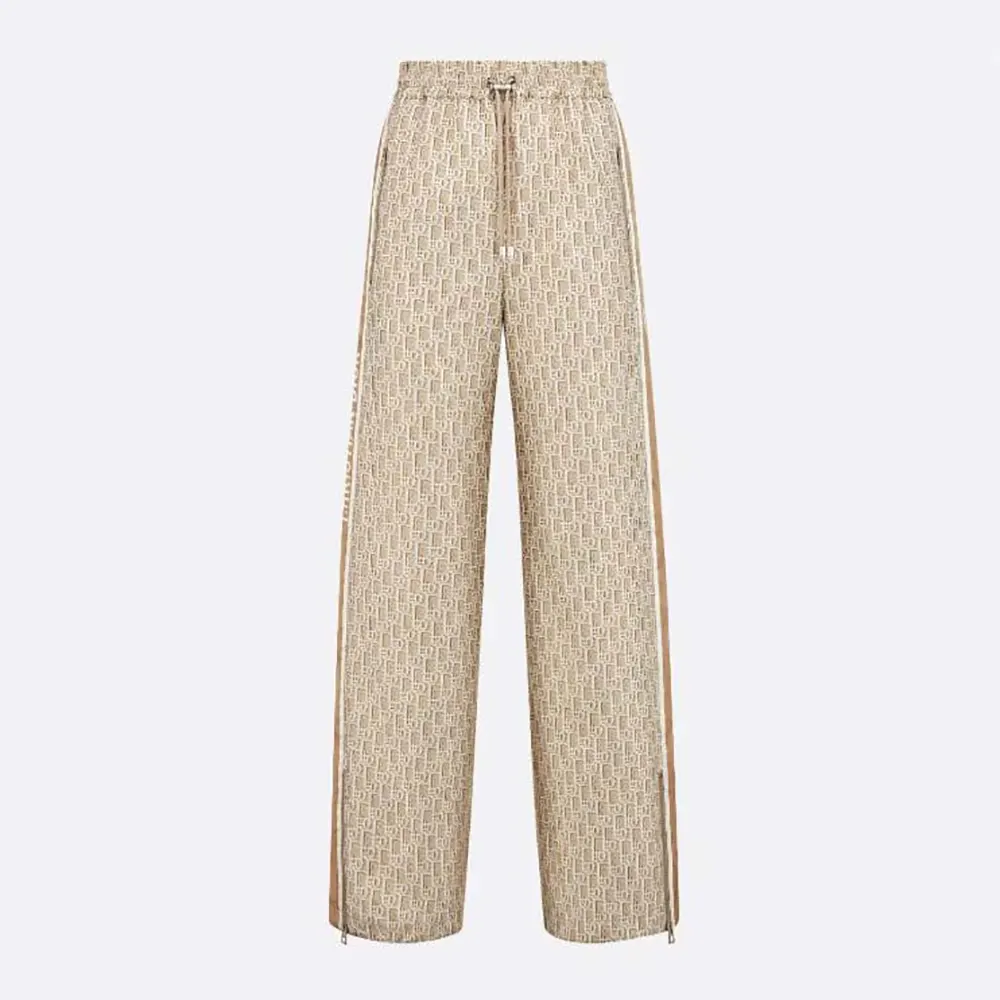 Front view of Dior Women Flared Pants Beige Technical Jacquard Taffeta