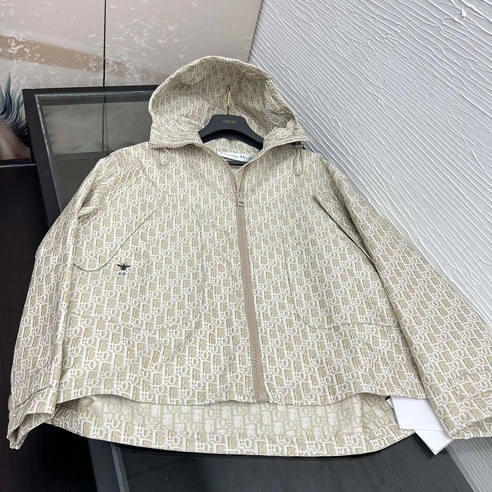 Close-up of signature Dior Oblique motif on jacket fabric