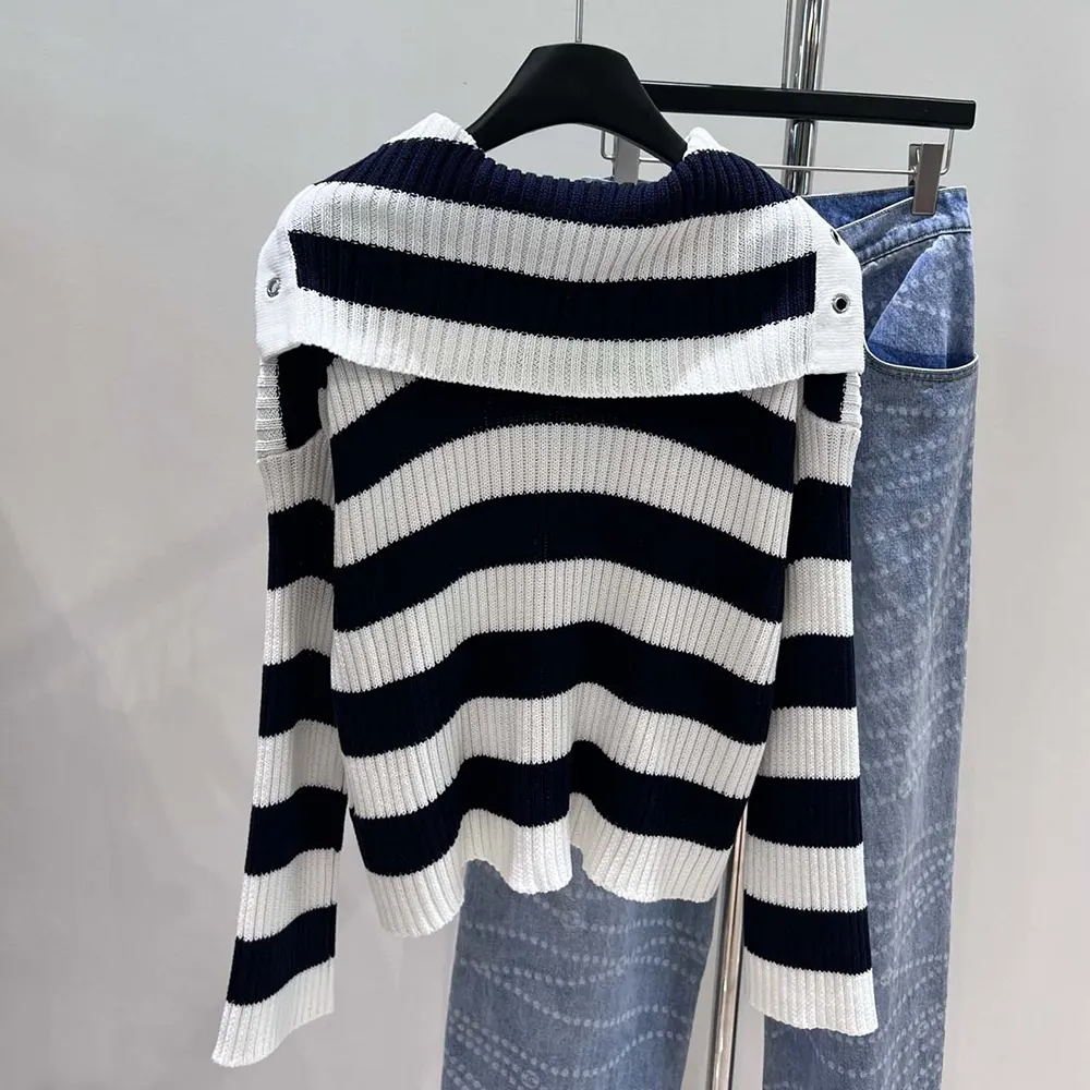 Side angle showing relaxed fit of Dior Women Marinière Sweater